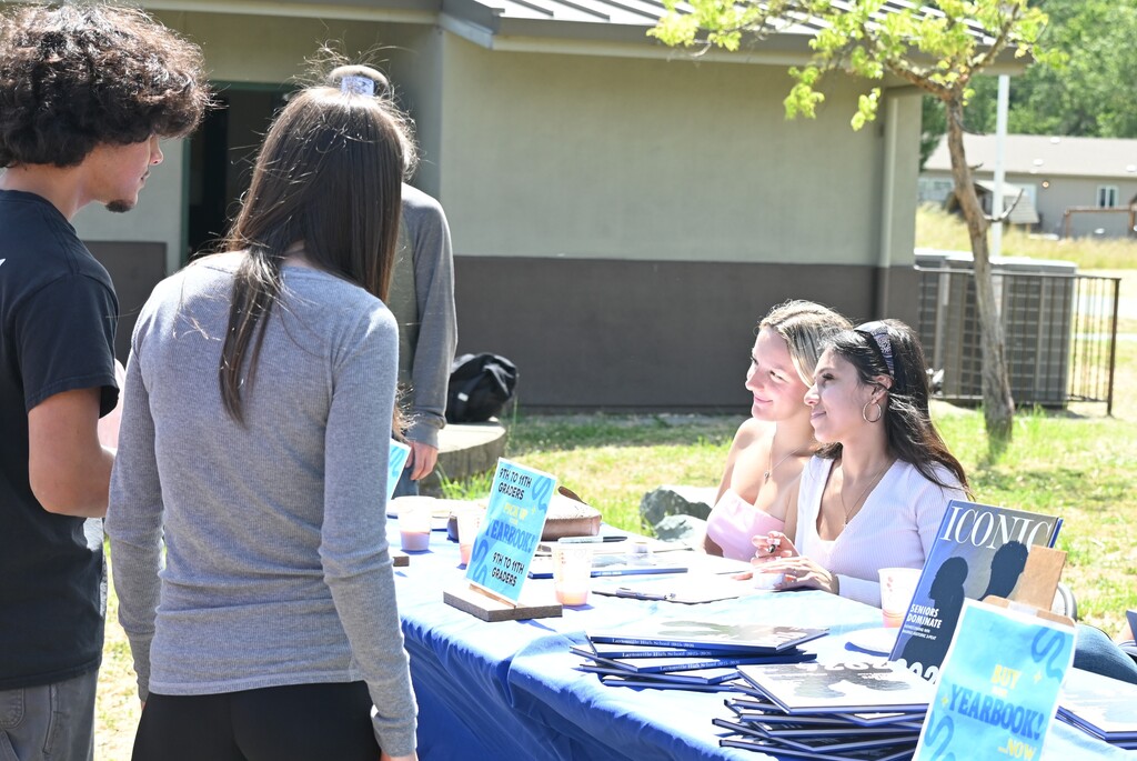 Students line up to pick up their yearbooks