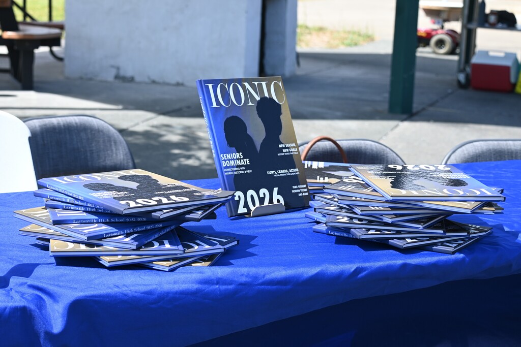 Yearbooks displayed at the pickup table