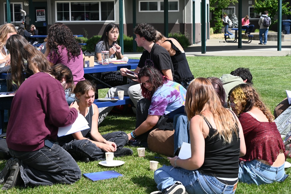 Students sign yearbooks