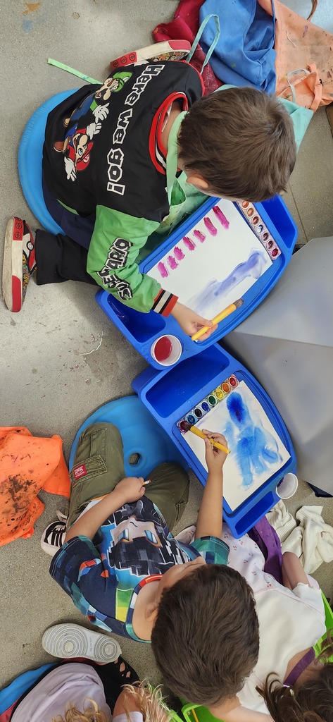 Nothing is more special than hearing the joyful exclamations of kids enjoying the magic of creating! Pictured: 1st graders exploring watercolor painting. 