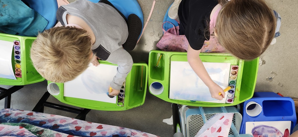 Nothing is more special than hearing the joyful exclamations of kids enjoying the magic of creating! Pictured: 1st graders exploring watercolor painting. 