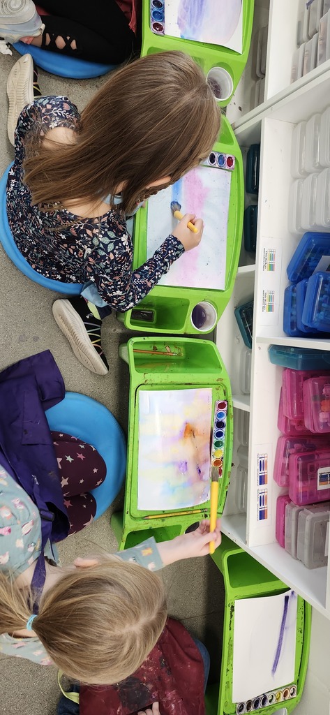Nothing is more special than hearing the joyful exclamations of kids enjoying the magic of creating! Pictured: 1st graders exploring watercolor painting. 
