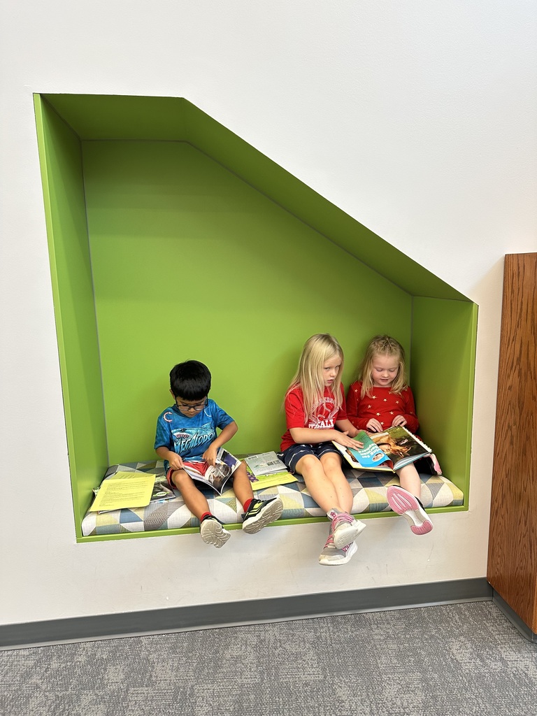 Kindergarten loves snuggling up with a book and a good friend!