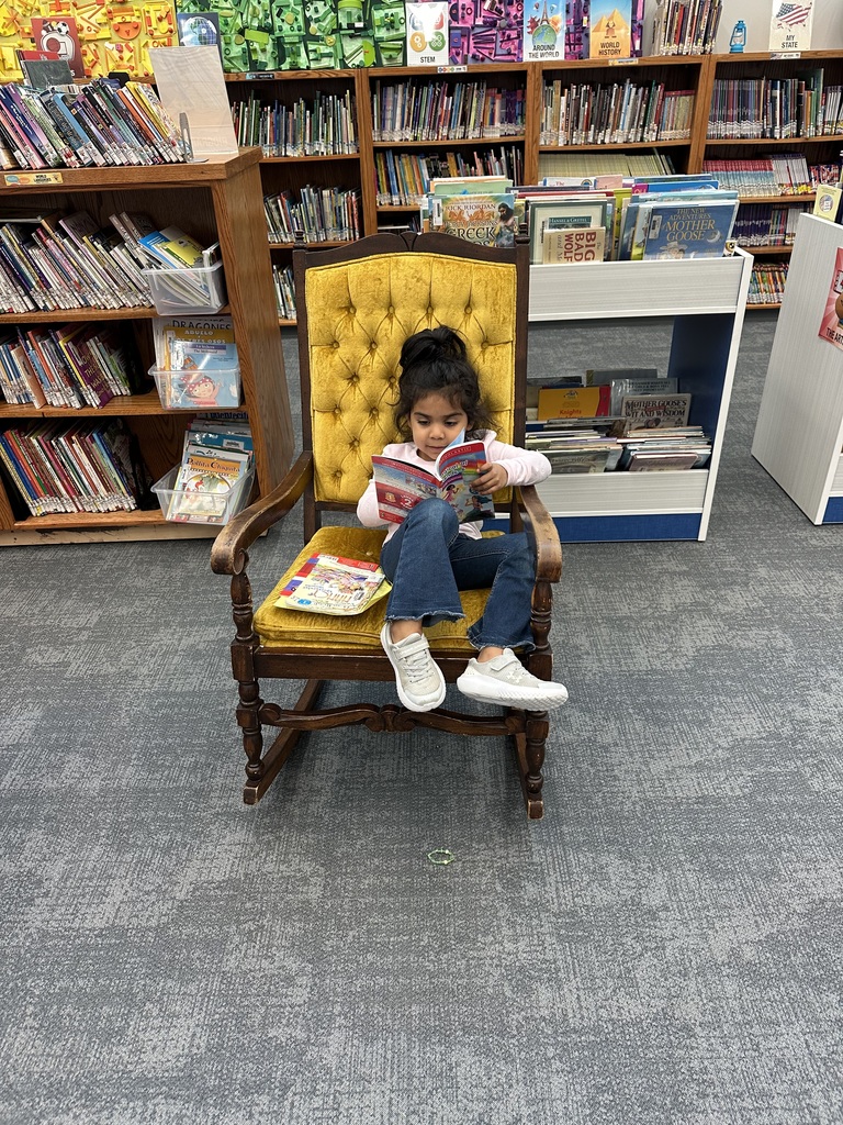 Kindergarten loves snuggling up with a book and a good friend!