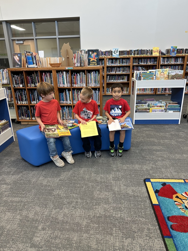 Kindergarten loves snuggling up with a book and a good friend!