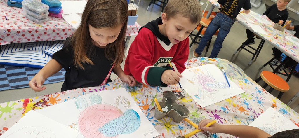 1st graders combined what they have learned about alebrijes with what the learned about pattern and wax resist with crayon and watercolor to create imaginary animals. Next week they will cut them out, stuff, and stitch them up to make sculptures. 