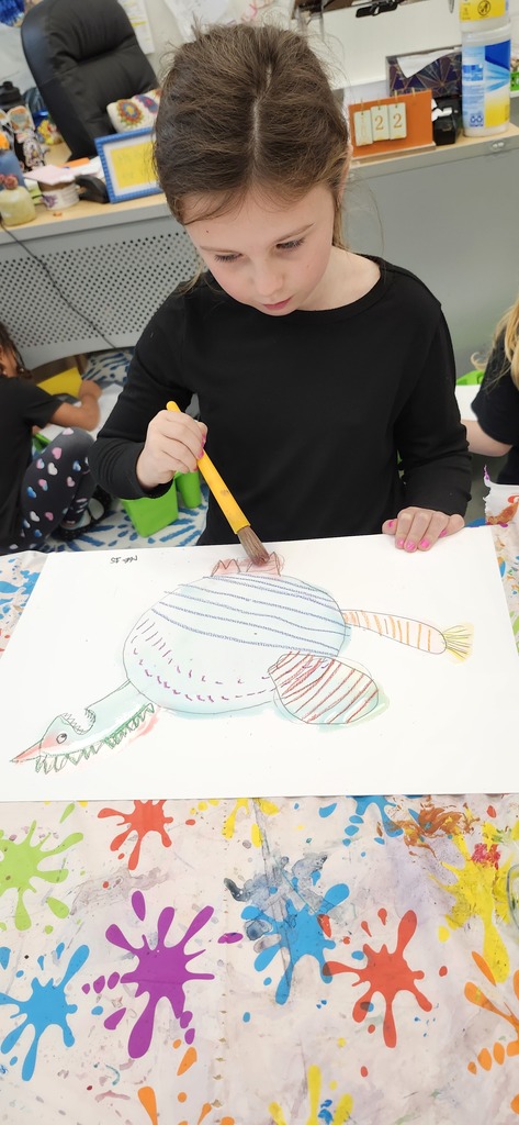 1st graders combined what they have learned about alebrijes with what the learned about pattern and wax resist with crayon and watercolor to create imaginary animals. Next week they will cut them out, stuff, and stitch them up to make sculptures. 