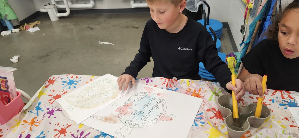 1st graders combined what they have learned about alebrijes with what the learned about pattern and wax resist with crayon and watercolor to create imaginary animals. Next week they will cut them out, stuff, and stitch them up to make sculptures. 