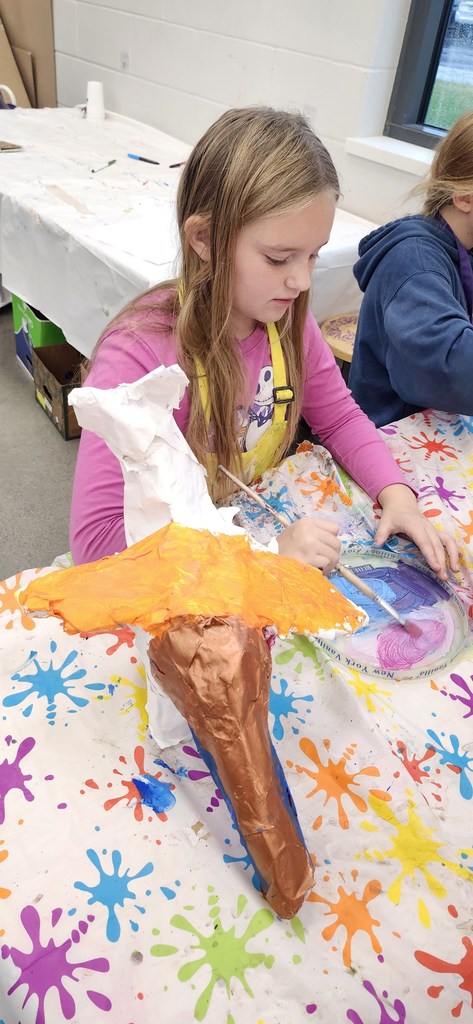 5th graders are all in different places working on their alebrijes inspired animal sculptures.  Some are finishing up with paper mache, some are painting, some adding patterns with paint markers, and a couple have completed them and are doing extension extra choices such as drawing a fantasy place that their animal would live in or writing an adventure story with their alebrije.