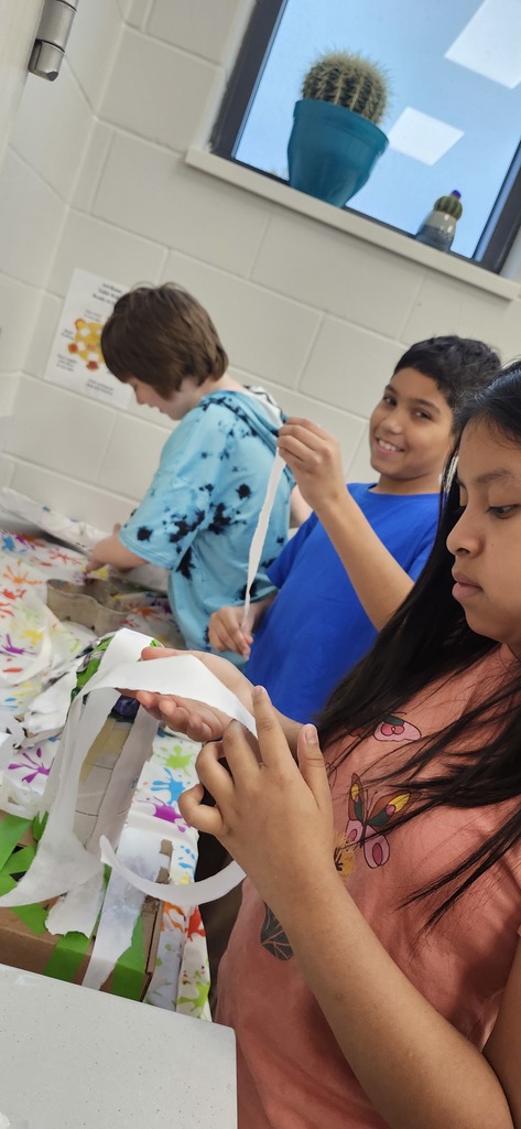 5th graders are all in different places working on their alebrijes inspired animal sculptures.  Some are finishing up with paper mache, some are painting, some adding patterns with paint markers, and a couple have completed them and are doing extension extra choices such as drawing a fantasy place that their animal would live in or writing an adventure story with their alebrije.