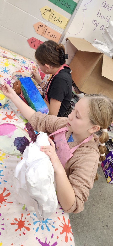 Students are working hard in art to finish painting their alebrije inspired animal sculptures. 