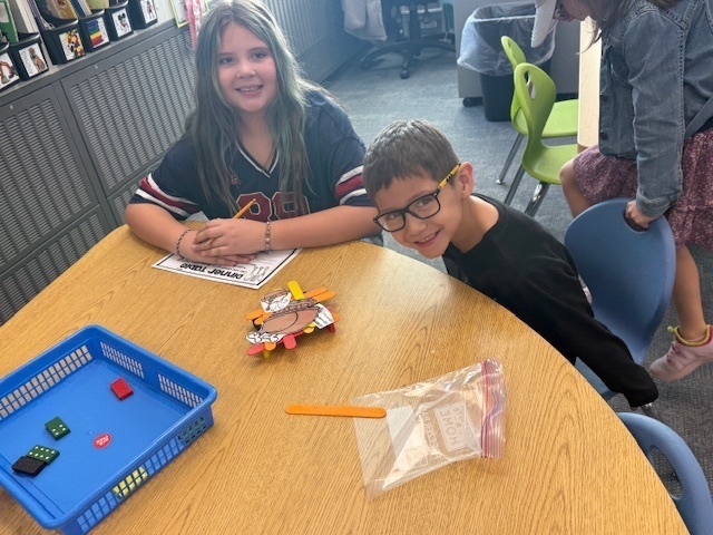 Kindergarten met with their third grade buddies today and did a Thanksgiving STEM activity. 🦃. Together, we made a blueprint for a Thanksgiving table that would fit all of our Thanksgiving day food. We constructed our design from our blueprint (and adjusted as necessary). So much fun!