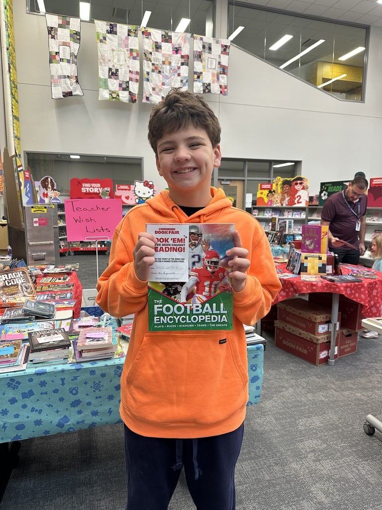 These friends were caught reading and won a free book from the book fair! Thanks to everyone who supported our book fair to support our readers and our library!