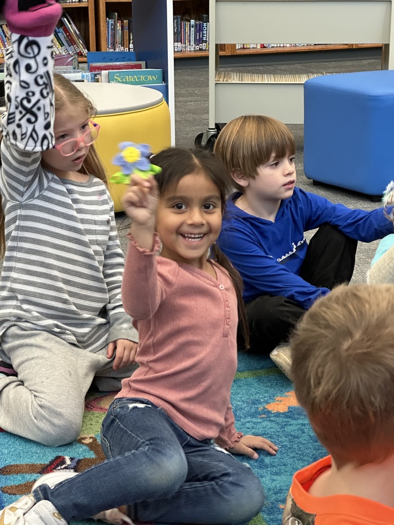 These kindergartners LOVED telling stories and using puppets with Ms. Nancy in library media class.