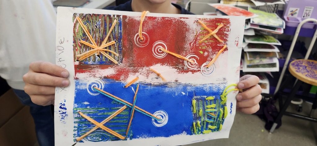 In art, 3rd graders had fun layering on top of their monoprints/gelli prints with stitching today. I love how thoughtful they were about where they placed the stitching.