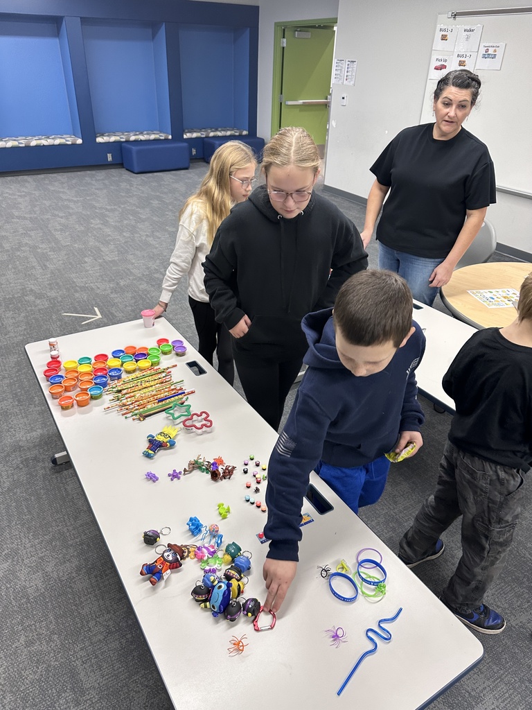 Gobbling to the prize table for Turkey Bingo. 