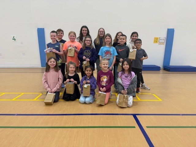 IMG_1713"Reading is Full of Surprises" was the theme this year at LSH Elementary as we celebrated I Love To Read Month! We had a surprise visit from Julie Gassman, a local author from St. Peter. Michael Callahan, a local magician, shared his magic tricks with K-5 earlier this month. Our grand celebration took place March 2 with a surprise visit from a local juggler, Adam St. Pierre! Students learned that reading can take us many places and we can learn many tricks when reading! Top readers from each class received some wonderful prizes. The Bar and Grill donated a free personal pan pizza. 300 Club donated a free game of bowling. Each top reader received a token to use in our new book vending machine that was donated from Le Sueur Rotary Club. A BIG SHOUT OUT to The Bar and Grill, 300 Club, and Le Sueur Rotary Club for all your support and generous donations. Congratulations to all our readers - Keep on reading and enjoying the surprises!