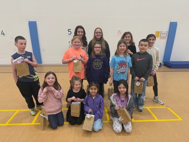 IMG_1713"Reading is Full of Surprises" was the theme this year at LSH Elementary as we celebrated I Love To Read Month! We had a surprise visit from Julie Gassman, a local author from St. Peter. Michael Callahan, a local magician, shared his magic tricks with K-5 earlier this month. Our grand celebration took place March 2 with a surprise visit from a local juggler, Adam St. Pierre! Students learned that reading can take us many places and we can learn many tricks when reading! Top readers from each class received some wonderful prizes. The Bar and Grill donated a free personal pan pizza. 300 Club donated a free game of bowling. Each top reader received a token to use in our new book vending machine that was donated from Le Sueur Rotary Club. A BIG SHOUT OUT to The Bar and Grill, 300 Club, and Le Sueur Rotary Club for all your support and generous donations. Congratulations to all our readers - Keep on reading and enjoying the surprises!