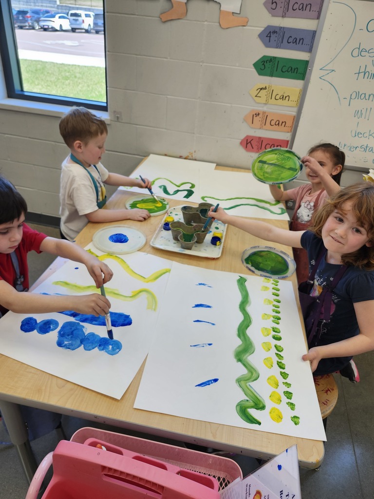 Wow nothing says spring like these beautiful green paintings!  Kindergartners explored mixing blue and yellow to make a variety of greens. I love the happy sounds of color mixing exploration..."Wow look at THIS green!" "Whoa that green is so dark!" "Look at that bright yellow green she made! " "Our water is all green now!" Such joy!
