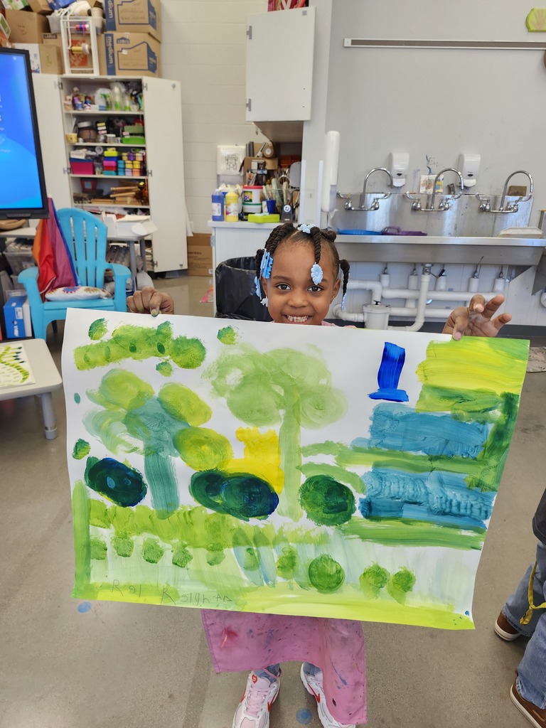 Look at these proud Kindergarten faces! Mixing green is so much fun!