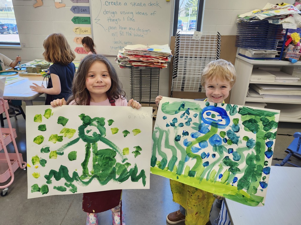 Look at these proud Kindergarten faces! Mixing green is so much fun!