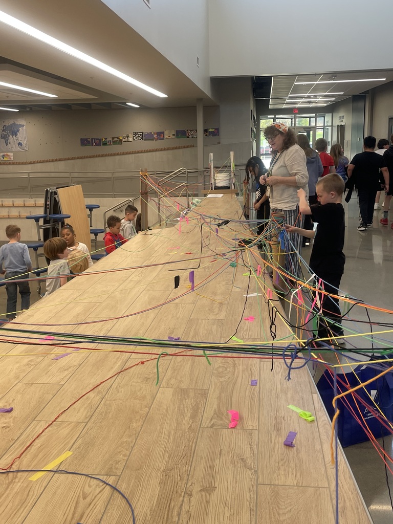 Students in K-2 are learning about temporary art by exploring with yarn bombing. What a fun time we had!