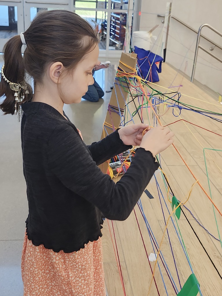 Students in K-2 are learning about temporary art by exploring with yarn bombing. What a fun time we had!