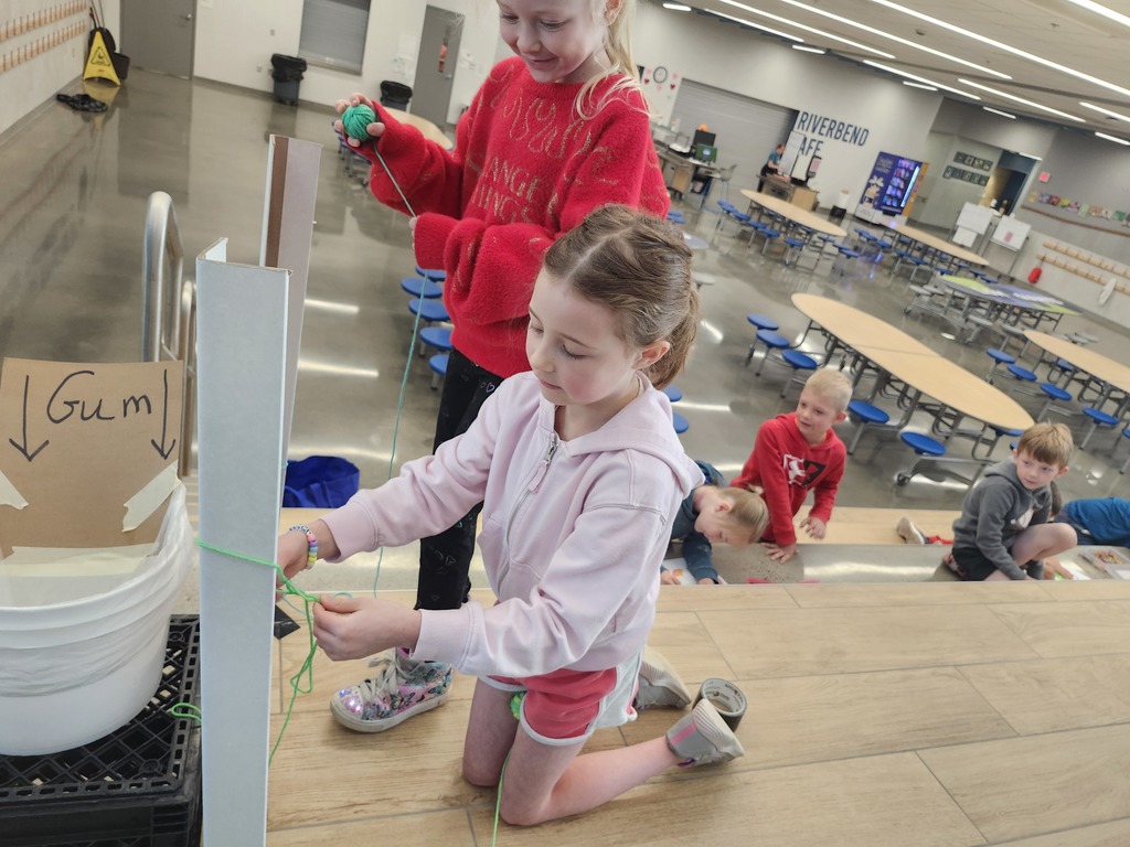 Students in K-2 are learning about temporary art by exploring with yarn bombing. What a fun time we had!