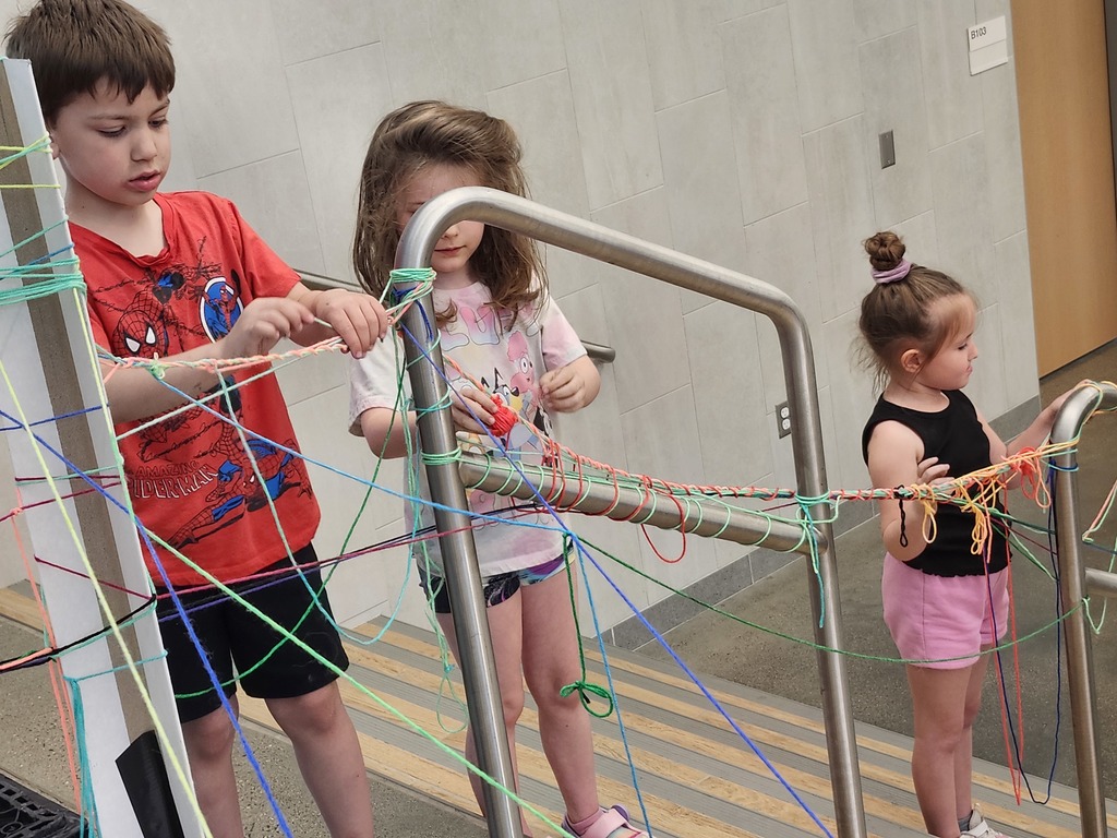 Kindergartners explored temporary art today. Look at the careful wrapping of the yarn! 