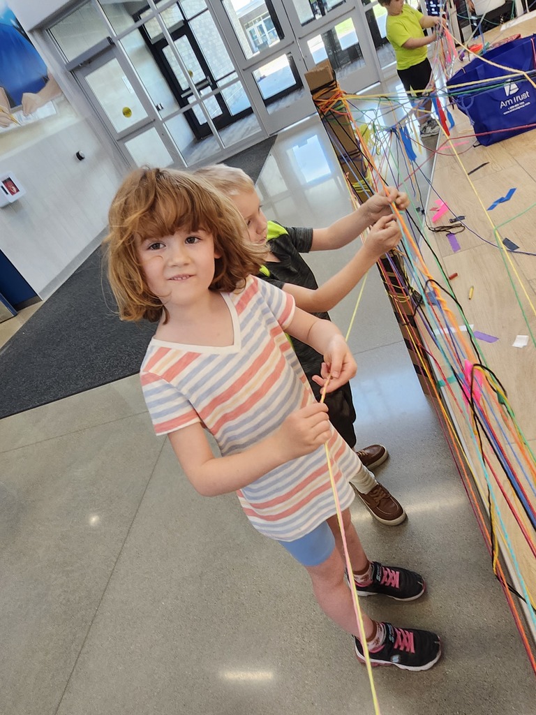 Kindergartners explored temporary art today. Look at the careful wrapping of the yarn! 