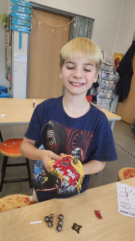 We started this year a little different in art Students have been asking to learn to sew so we made fabric collages with their names on them. Pictured 5th graders and their work. 
