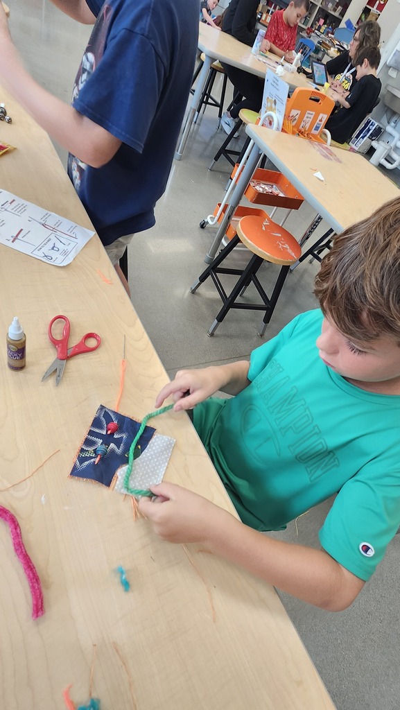 We started this year a little different in art Students have been asking to learn to sew so we made fabric collages with their names on them. Pictured 5th graders and their work. 