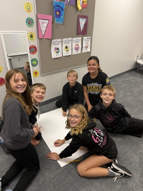 LSH Elementary student council creating posters for the float tomorrow!