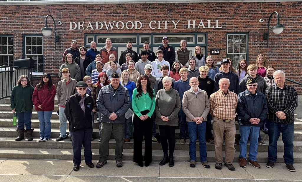students standing in front of City Hall
