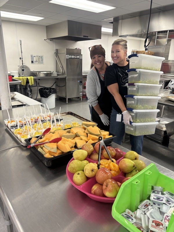 Miss Kendra & Miss Tera serving Breakfast & Snacks