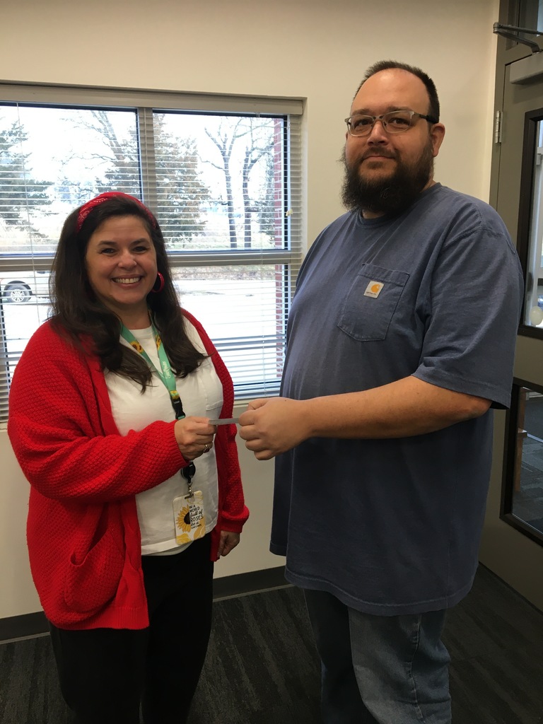 Mrs. Burns accepting $500 donation from the American Legion Douglas/MacArthur Post 340 of Diamond City and Lead Hill.