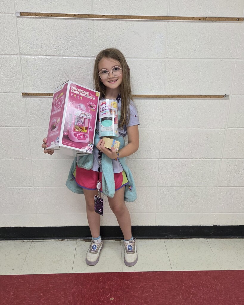 Eleanor Archer and Lilly Mathis had Perfect Attendance for the entire school year! They're posing with the prizes they selected as their reward. Great job, Tigers!