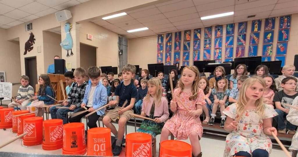 Students playing drums