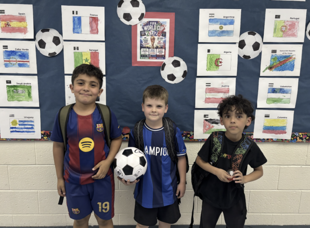 Kids in World Cup Fifa gear.