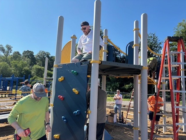 Mark Westkott and parents building the new JWL Playground