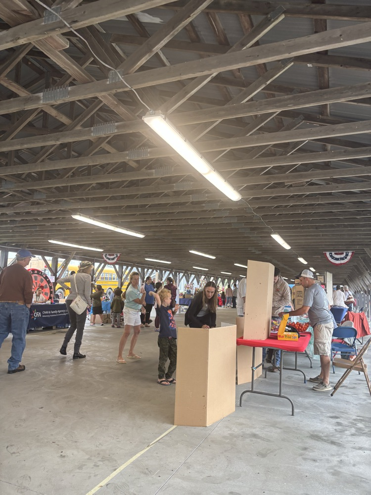 picture of crowd under pavilion 