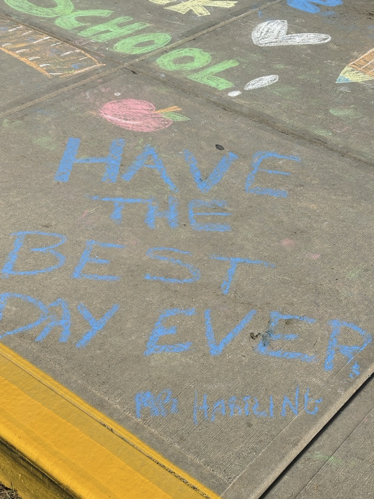 chalk writing on a sidewalk saying make it the best day ever