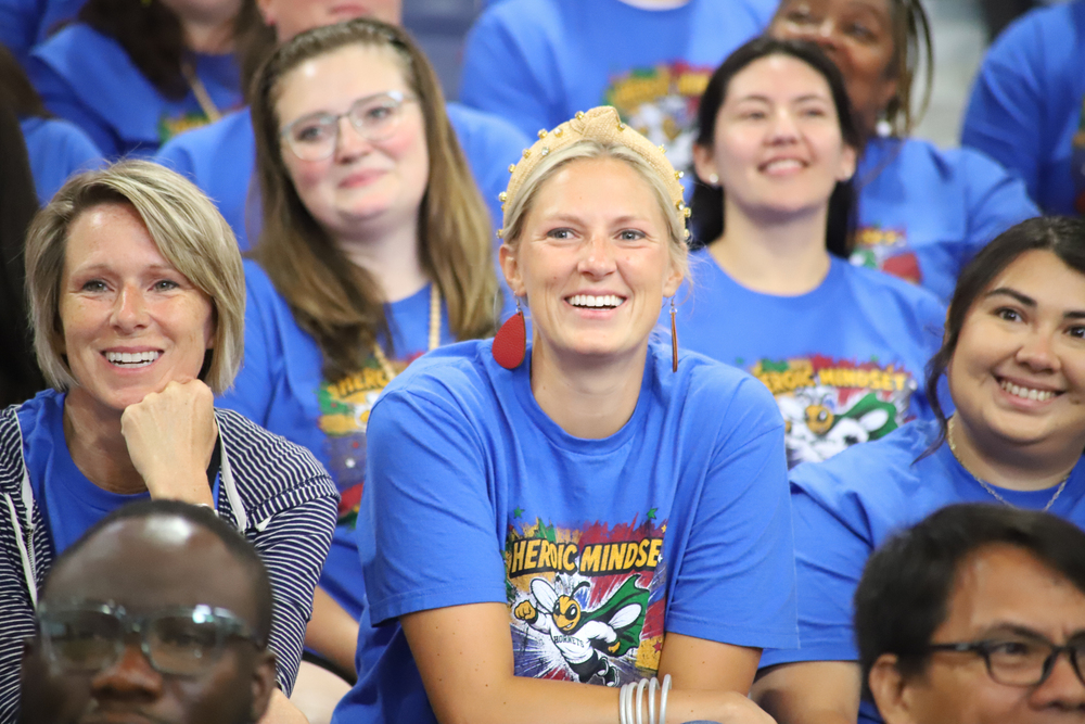 Greenwood teachers look on as Brandon Curry speaks to staff at Convocation 2026