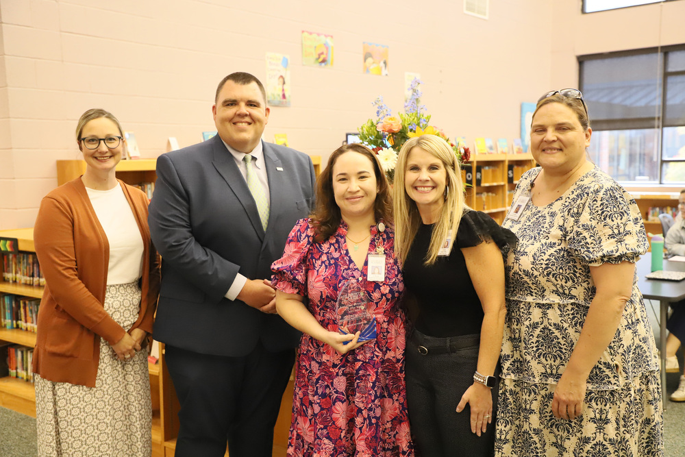 Assistant Principal of the Year Elayne Monjar pictured with district Leadership
