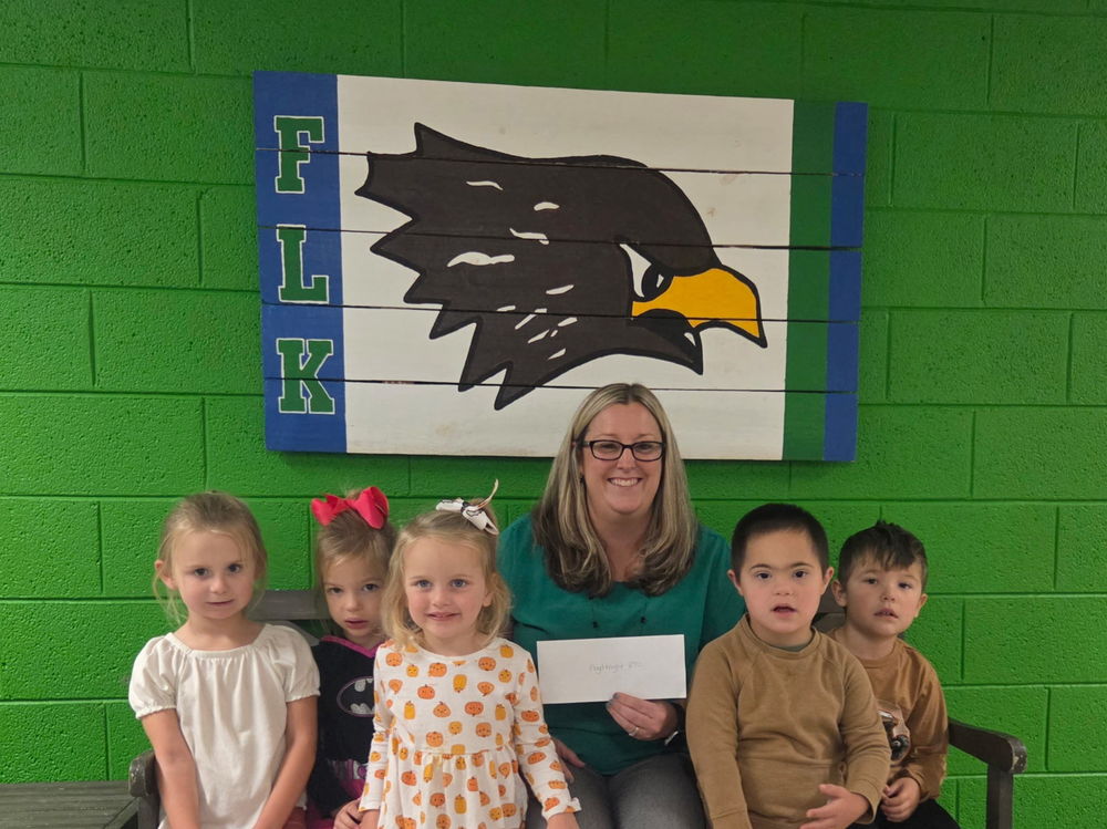 FLK accepts PTO Thrift Shop Donation Check