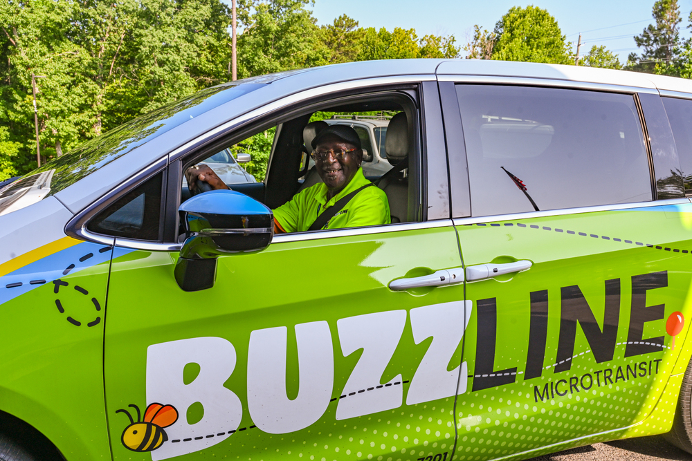 Buzzline Driver picking up a passenger