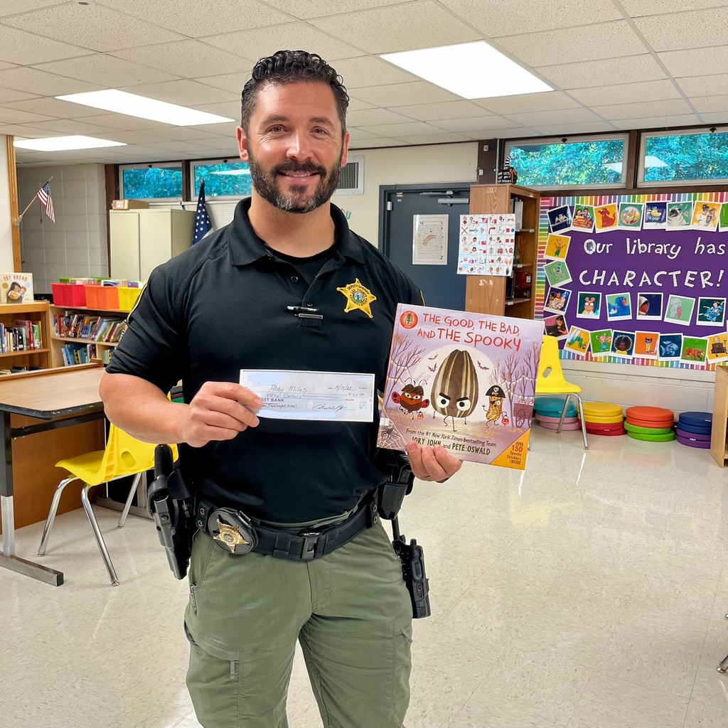 Officer Coffer's Donation for the Library