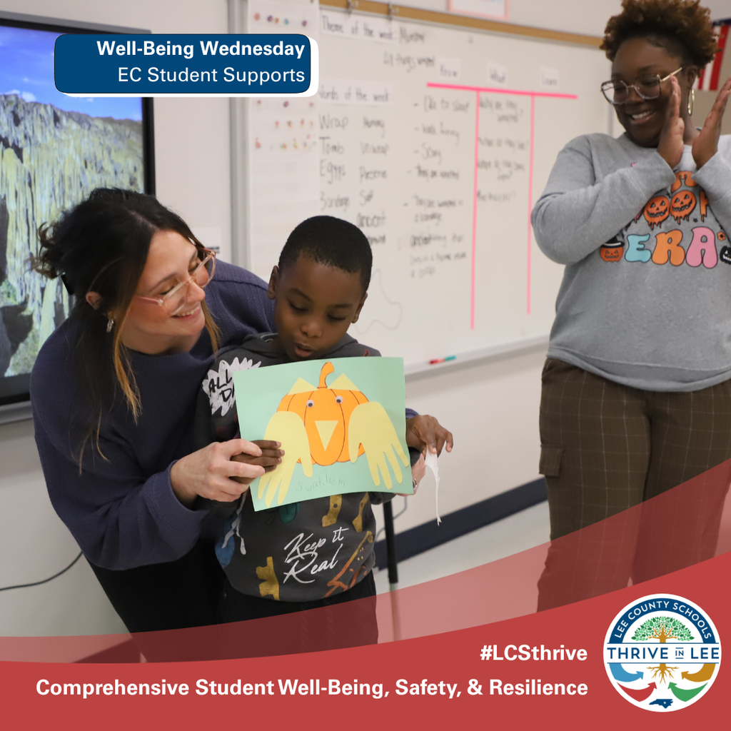 EC Student being supported during a presentation by an EC Assistant