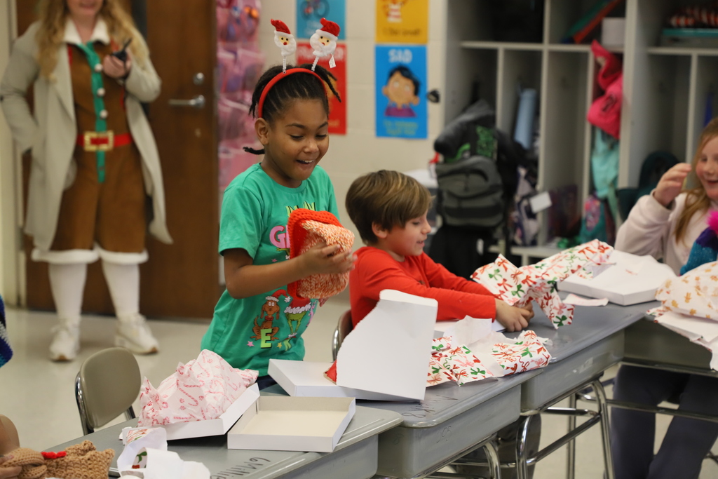 Yolanda Vazquez gifts each student a handmade hat, matching their own design, as a christmas gift from her and her family