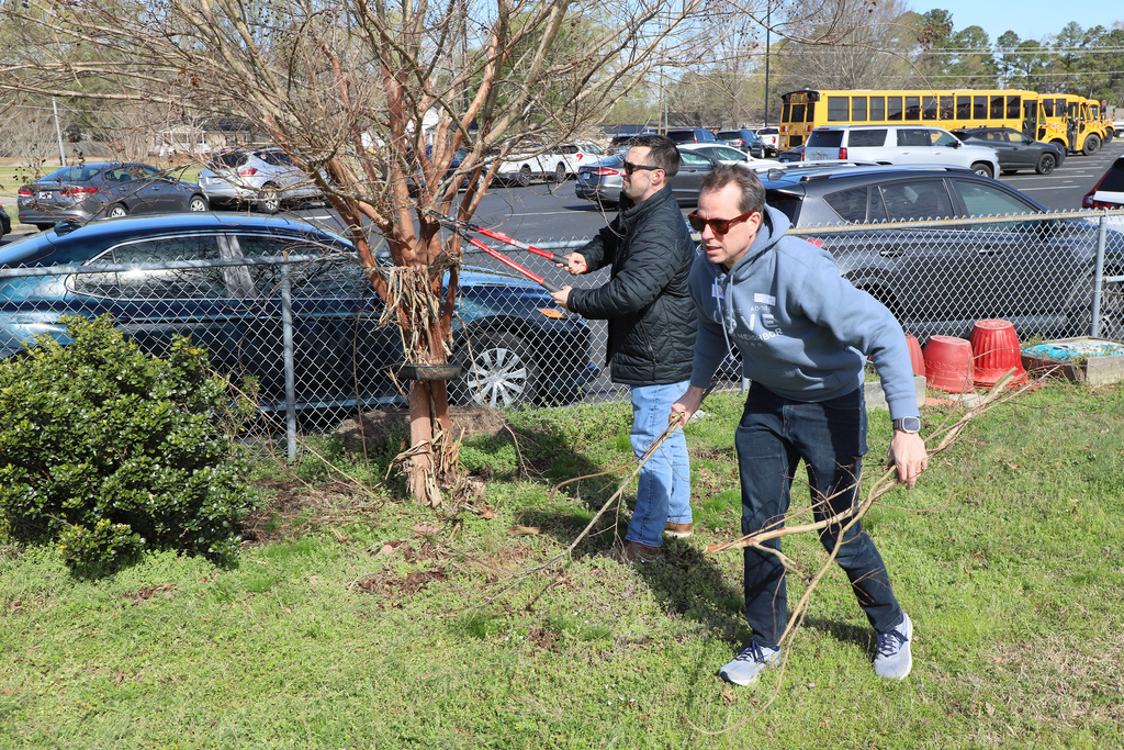 United Methodist Ministers serve and learn about volunteer opportunities at schools in their community